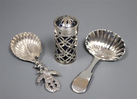 A 1970s silver commemorative dish, a Georgian silver caddy spoon, Dutch caddy spoons and other items.